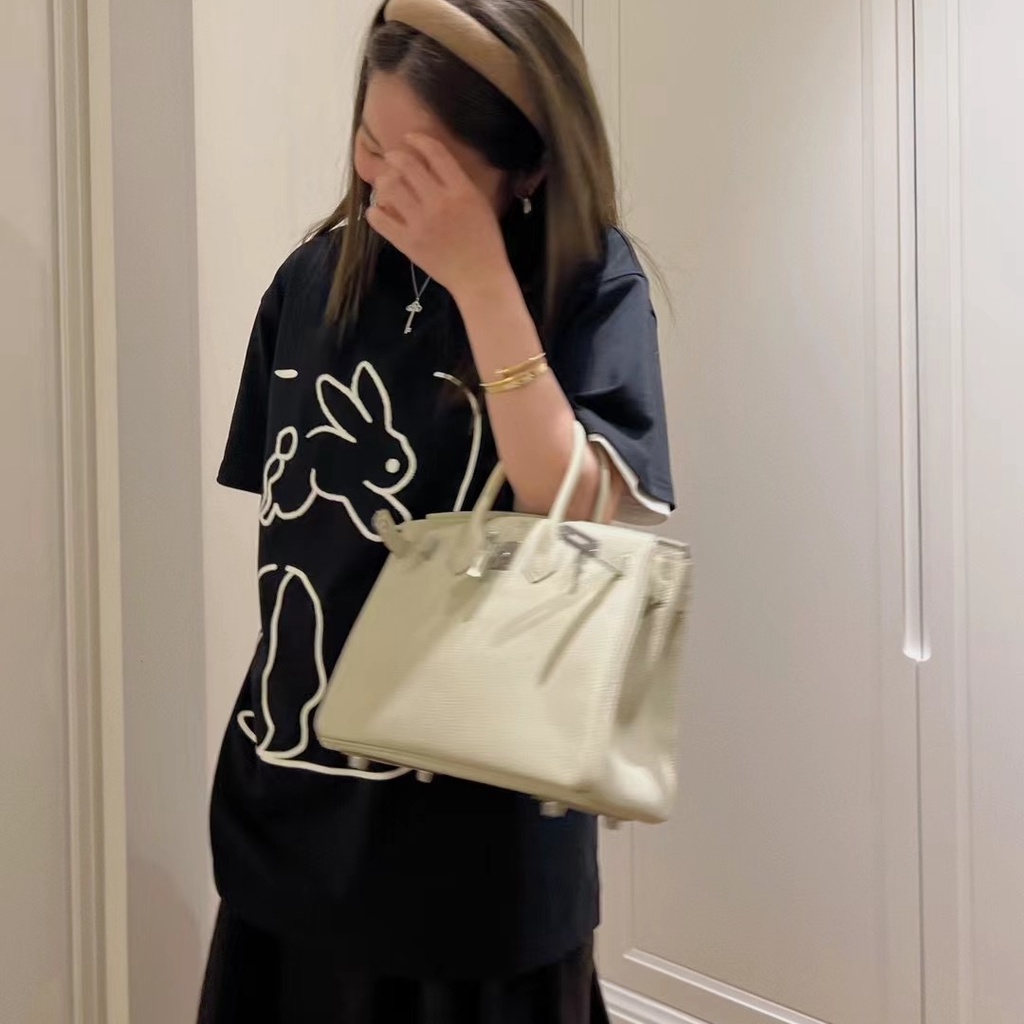 Áo thun SUXI tay ngắn cổ tròn dáng rộng in họa tiết đơn giản thời trang mùa xuân cho nữ