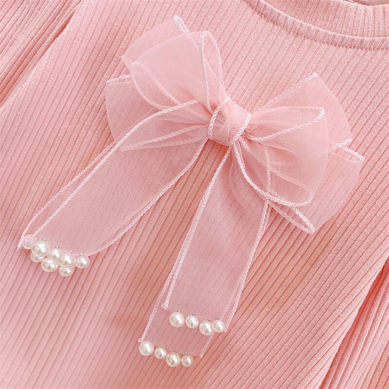 Áo Thun Tay Dài Dệt Kim Màu Trơn Đính Nơ Thời Trang Xuân Thu Xinh Xắn Cho Bé Gái 3-7 Tuổi