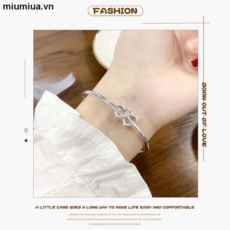 miumiuaVòng đeo tay mạ bạc mặt trái tim đôi thời trang dành cho nữ Vòng Tay Mạ Bạc Hình Trái Tim Đôi Thời Trang Cho Nữ