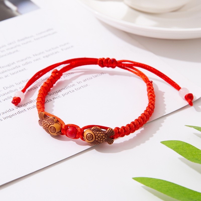 Sỉ 10 Vòng đeo tay chỉ đỏ dây rút cá gỗ may mắn