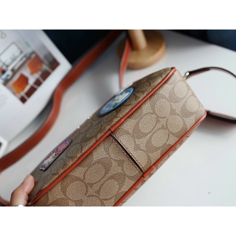 Túi đeo chéo unisex Coach X Peanuts