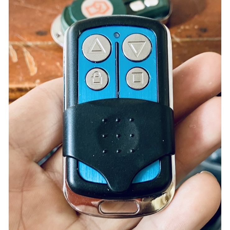 Điều khiển cửa cuốn _ REMOTE chìa khoá cửa cuốn MÃ NHẢY giá rẻ