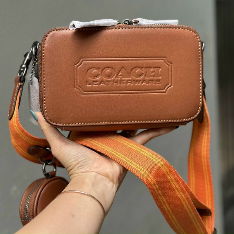 Túi COAC.H đeo chéo da thật xịn xò