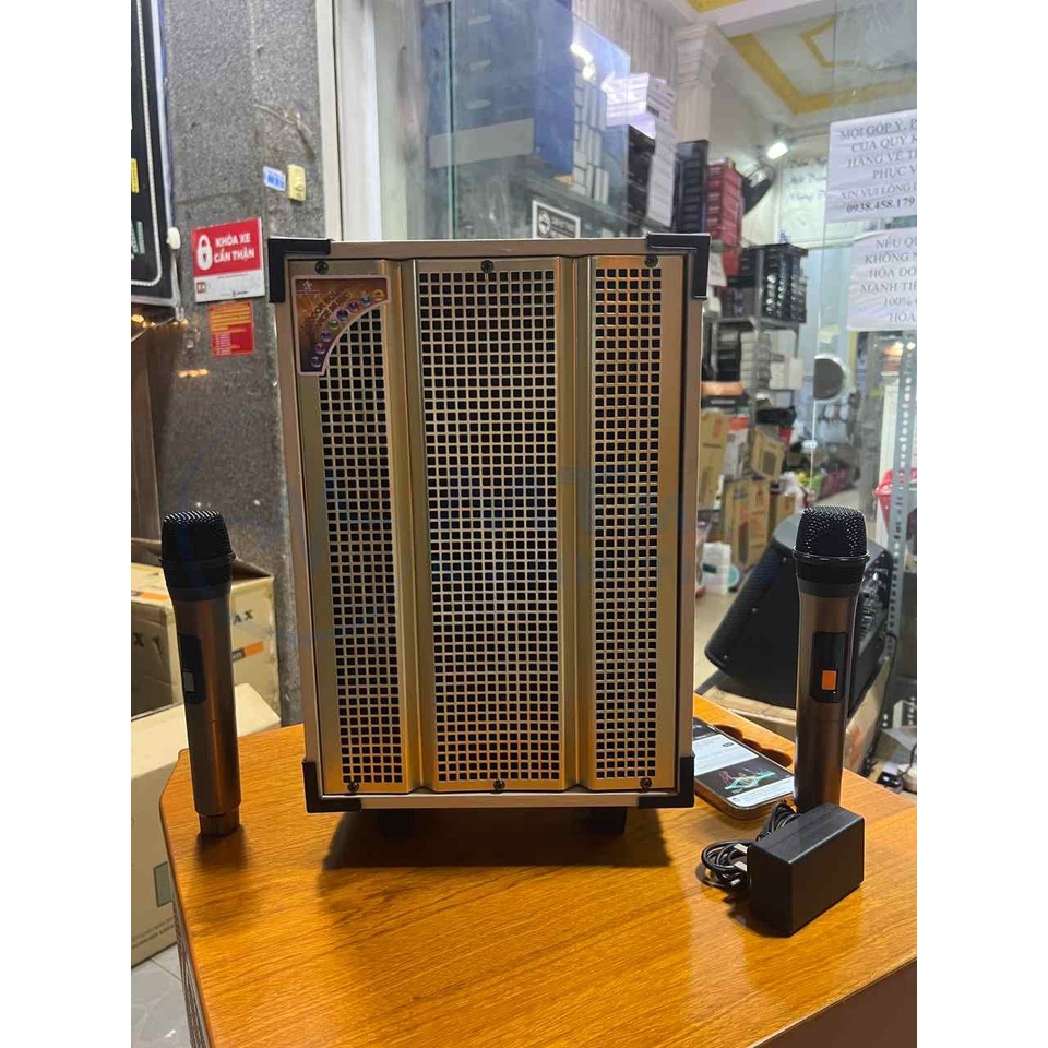 Loa kéo karaoke xách tay di động T8 bass 20cm tặng kèm cặp micro không dây. Âm thanh hay, thiết kế gọn, sạc pin tiện...