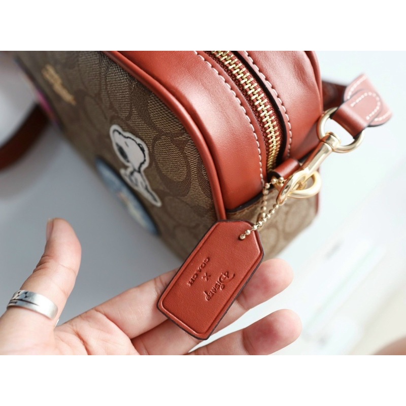 Túi đeo chéo unisex Coach X Peanuts
