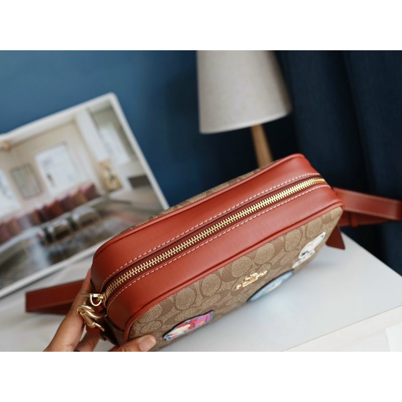 Túi đeo chéo unisex Coach X Peanuts