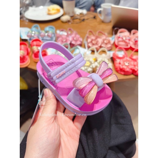 Dép Zaxy quai ngang nơ kẹo tím