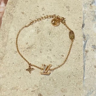 Lắc tay l.v vàng basic