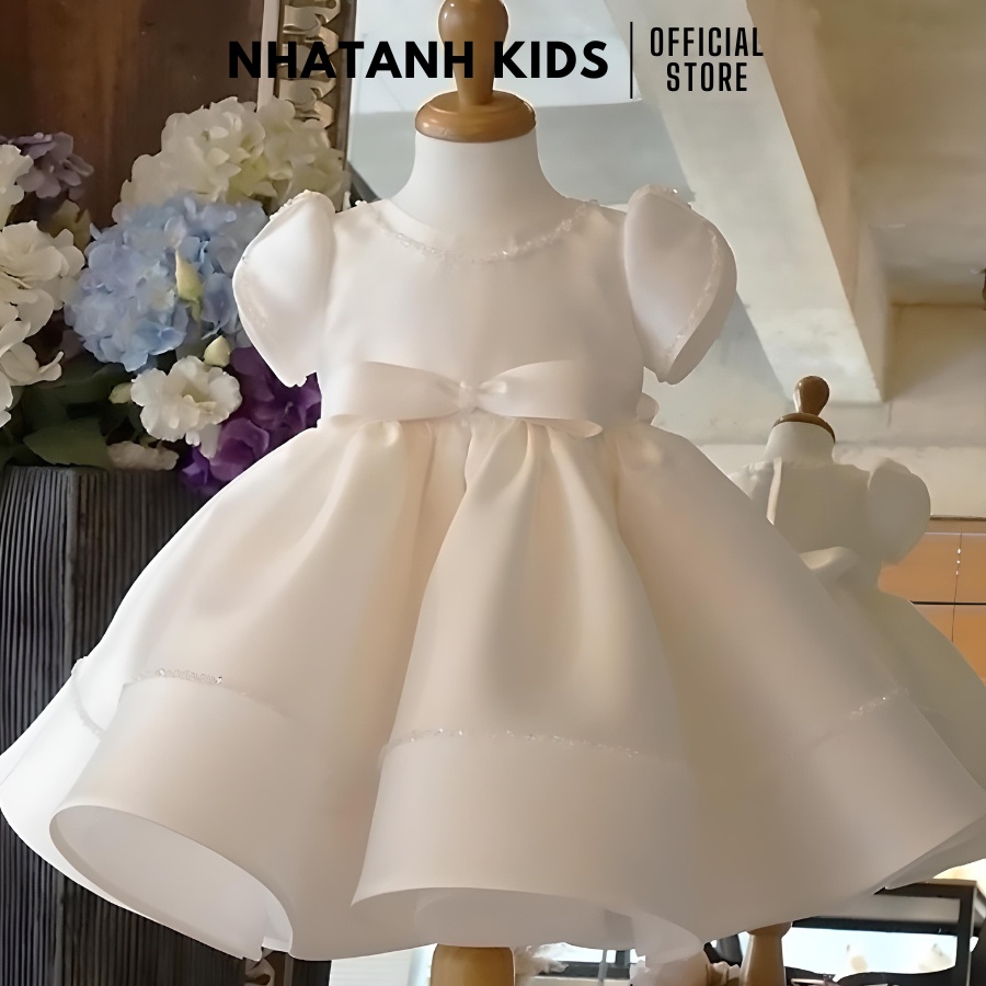 Đầm công chúa bé gái NHATANH KIDS màu trắng tay búp viền ngọc quanh váy cho bé từ 0-12 tuổi NA30