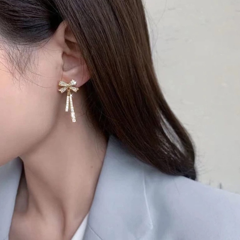 Khuyên Tai Bạc Dạng Hạt Đính Nơ Tua Rua Phong Cách Lạnh Cao Cấp jp5