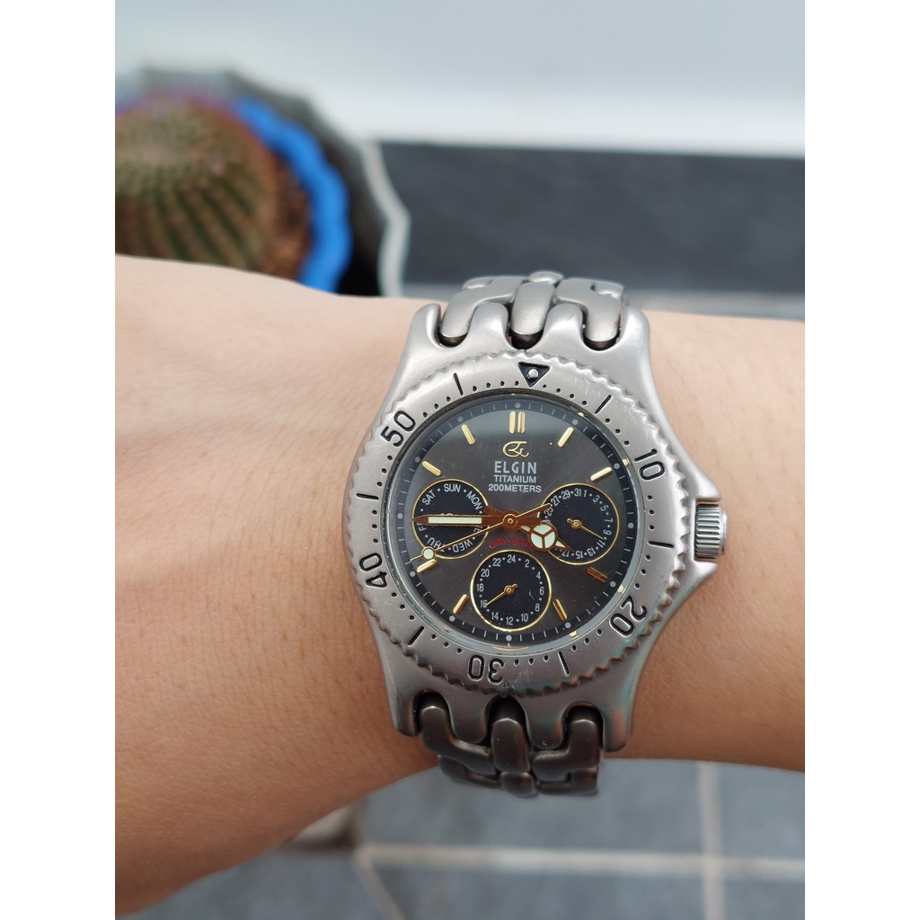 Đồng hồ nam Elgin 6 kim Titanium chữ trắng chạy pin hàng Si