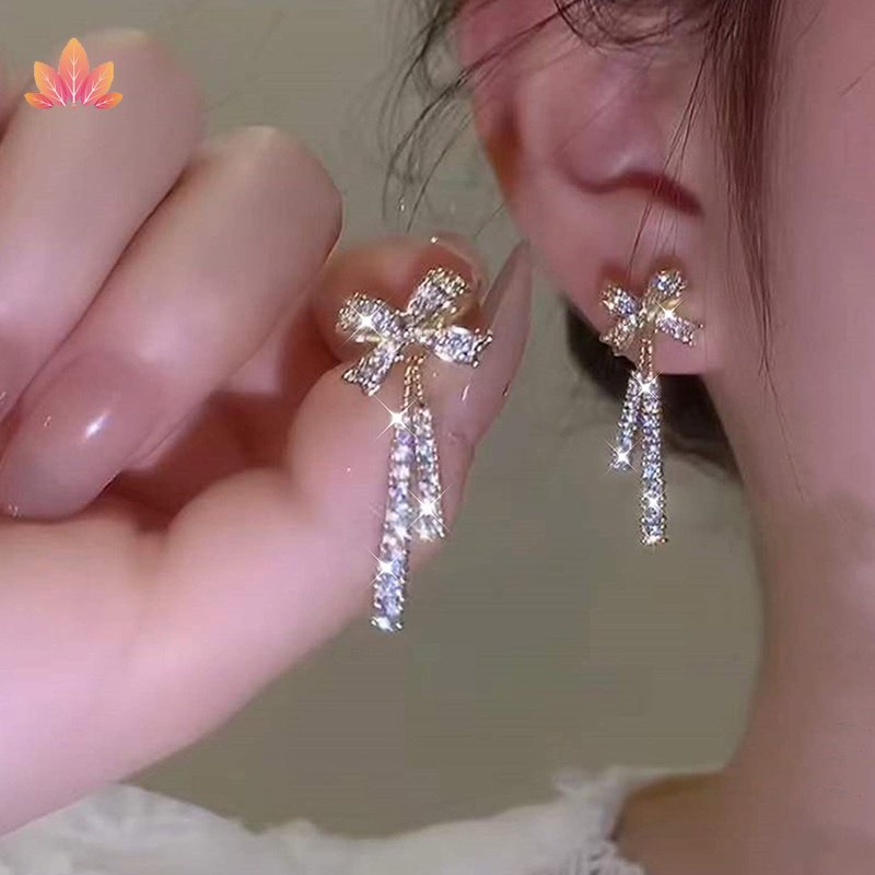 Khuyên Tai Bạc Dạng Hạt Đính Nơ Tua Rua Phong Cách Lạnh Cao Cấp jp5