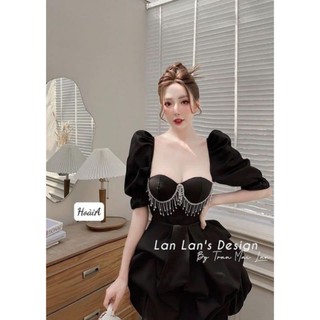Đầm tay phồng cúp ngực đính đá.