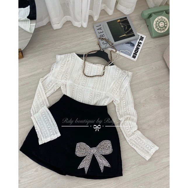 Chân váy tacta dáng chữ A đính nơ đá