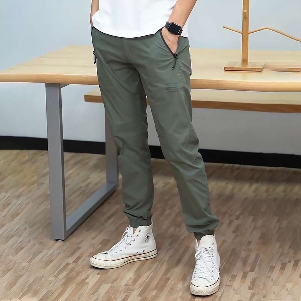 Quần Jogger Gió Nam Túi Khóa Thiết Kế Lưng Thun Cao Cấp 4 Màu Đen Xám Be Rêu