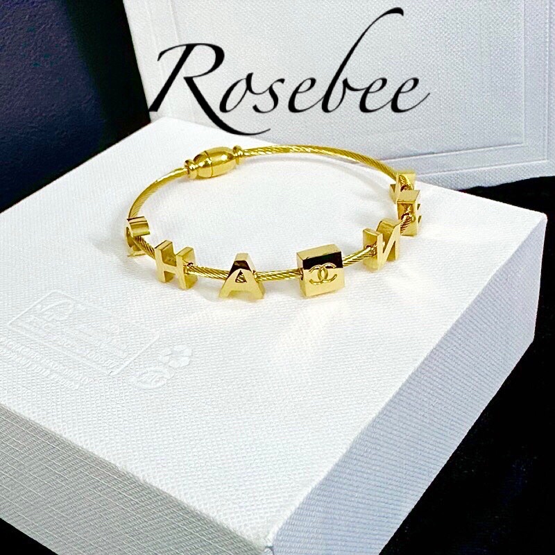 Vòng tay titan phối charm hiệu X không rỉ thời trang