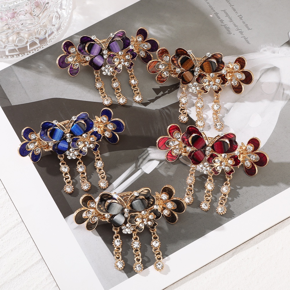 Kẹp tóc tua rua Haimeikang hình hoa bướm đính đá thời trang Hàn Quốc