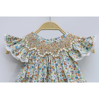 ĐẦM SMOCK HOA NHÍ