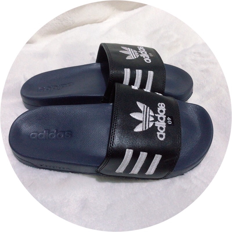Dép adidas quai da logo thiêu