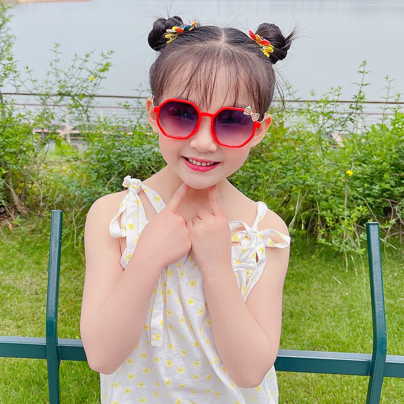 Kính râm trẻ em chống nắng chống bụi cho bé thiết kế thêm chi tiết nơ xinh xắn dễ thương