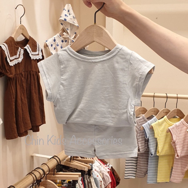 Bộ quần áo cotton trơn cổ tròn nhiều màu cho bé trai bé gái