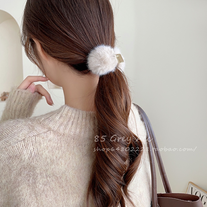 Kẹp tóc kim loại đính lông hàng cao cấp.