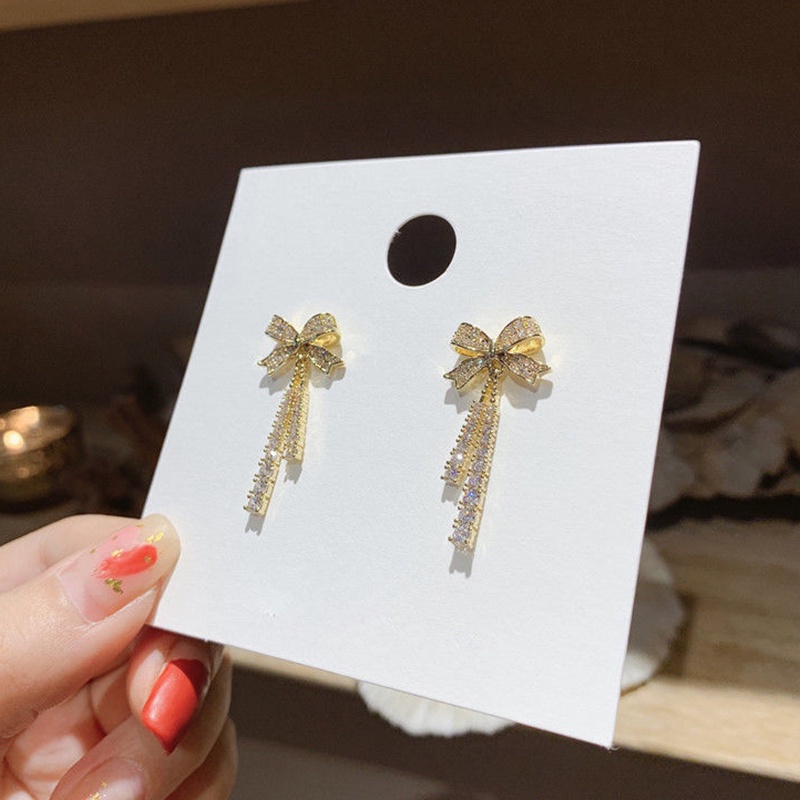 Khuyên Tai Bạc Dạng Hạt Đính Nơ Tua Rua Phong Cách Lạnh Cao Cấp jp5