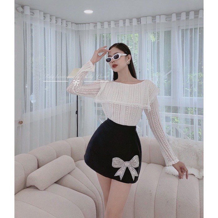 Chân váy tacta dáng chữ A đính nơ đá