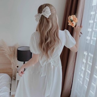 Đầm váy trắng dây thắt chéo eo lệch tà