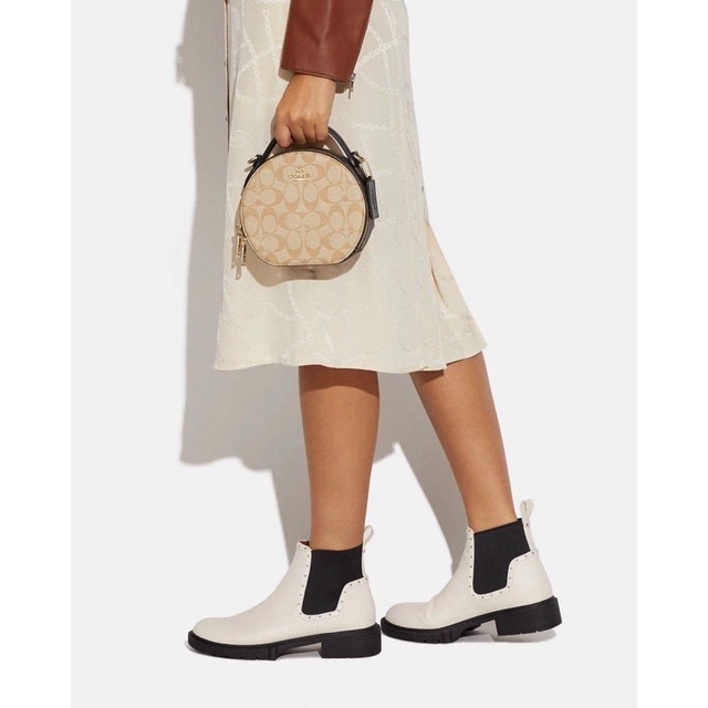 Túi đeo chéo Coach Top dáng tròn