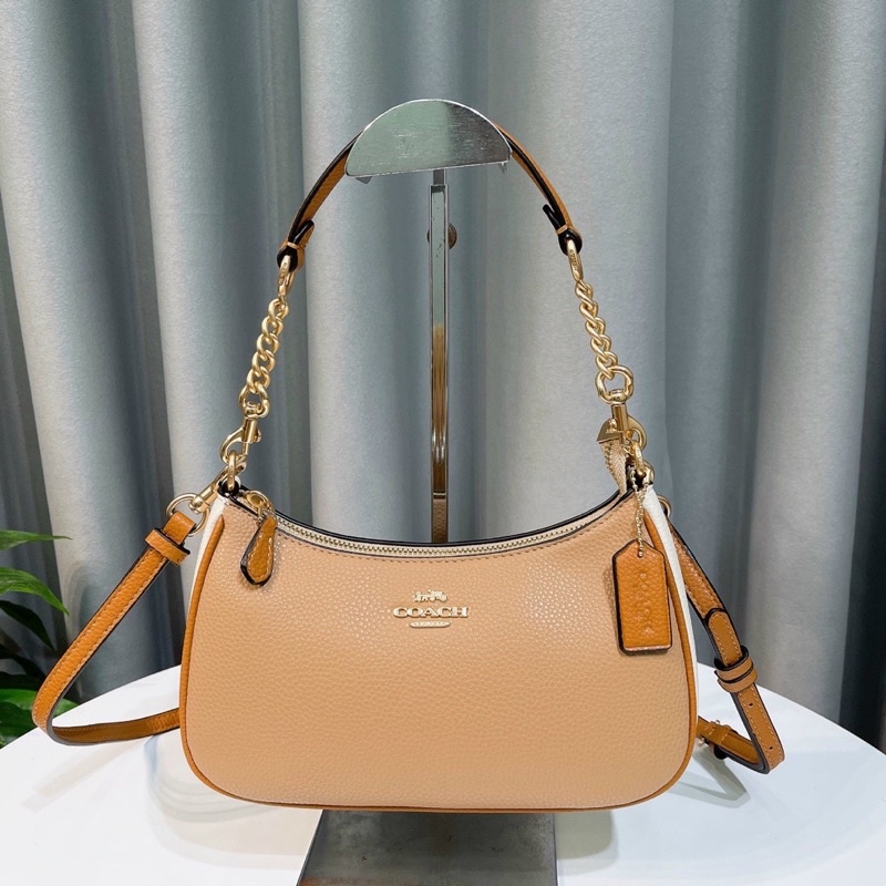 Túi đeo chéo đeo vai Coach Teri dáng thuyền màu nude