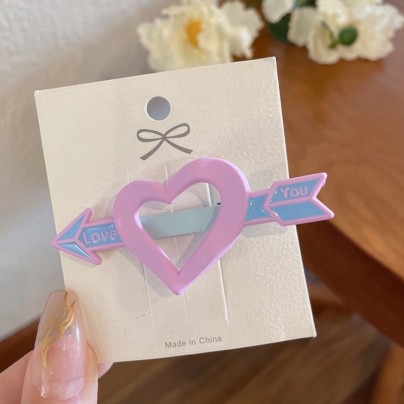 Kẹp Tóc Mái Bên Trán Màu Sắc Hình Mũi Tên Xuyên Qua Trái Tim Dễ Thương Cho Bé