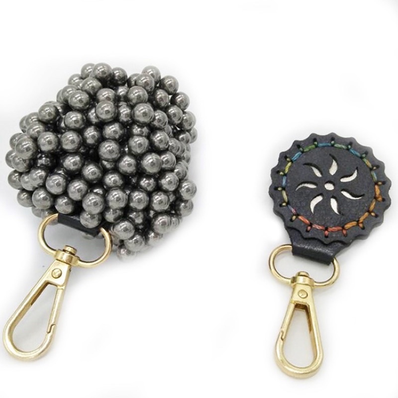 Hít bi bát giác móc khoá vàng