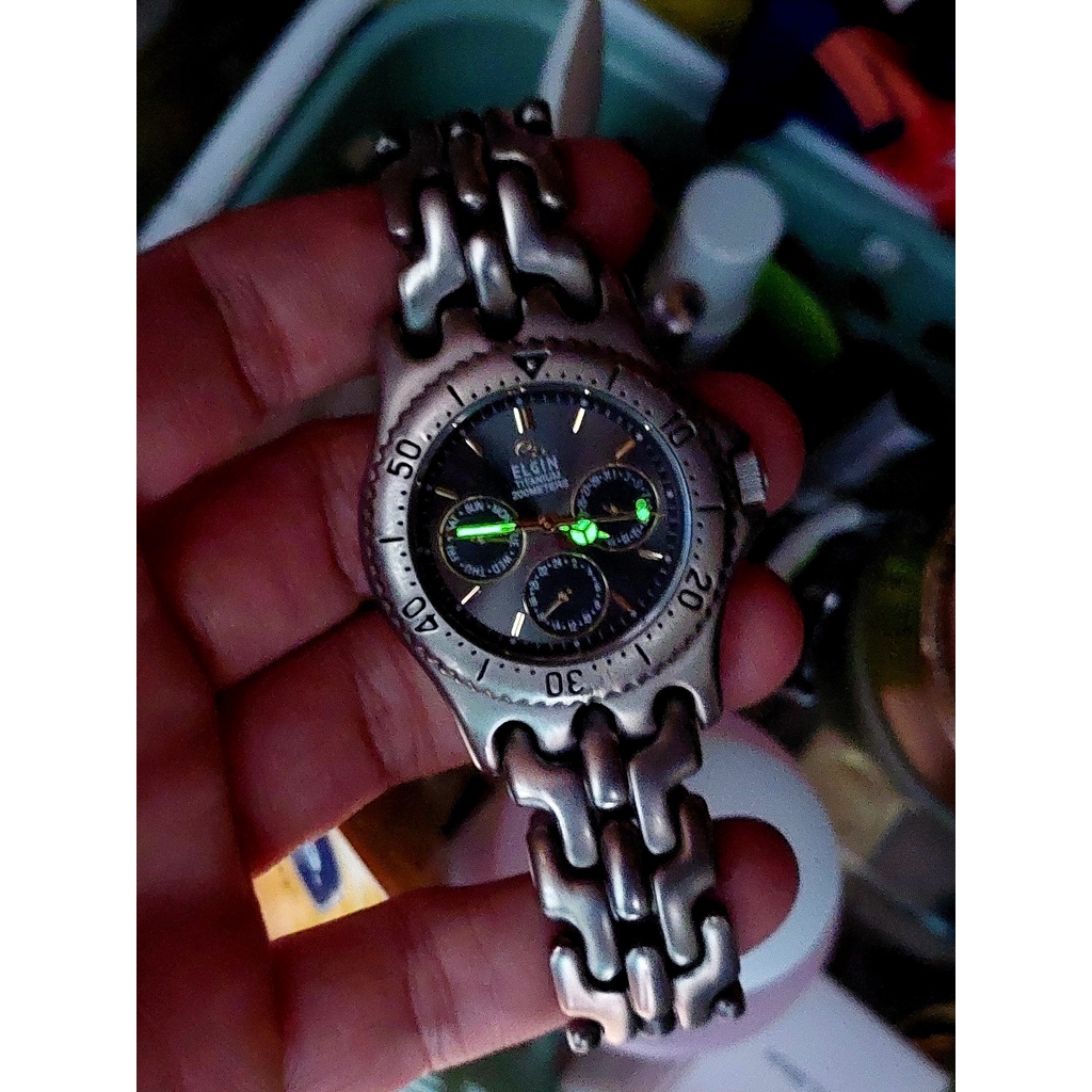 Đồng hồ nam Elgin 6 kim Titanium chữ trắng chạy pin hàng Si