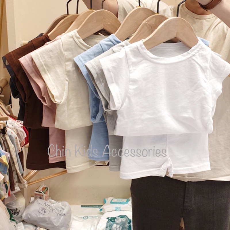 Bộ quần áo cotton trơn cổ tròn nhiều màu cho bé trai bé gái