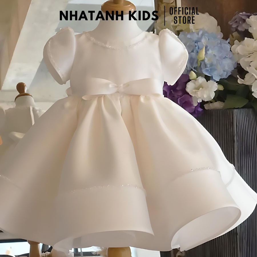 Đầm công chúa bé gái NHATANH KIDS màu trắng tay búp viền ngọc quanh váy cho bé từ 0-12 tuổi NA30