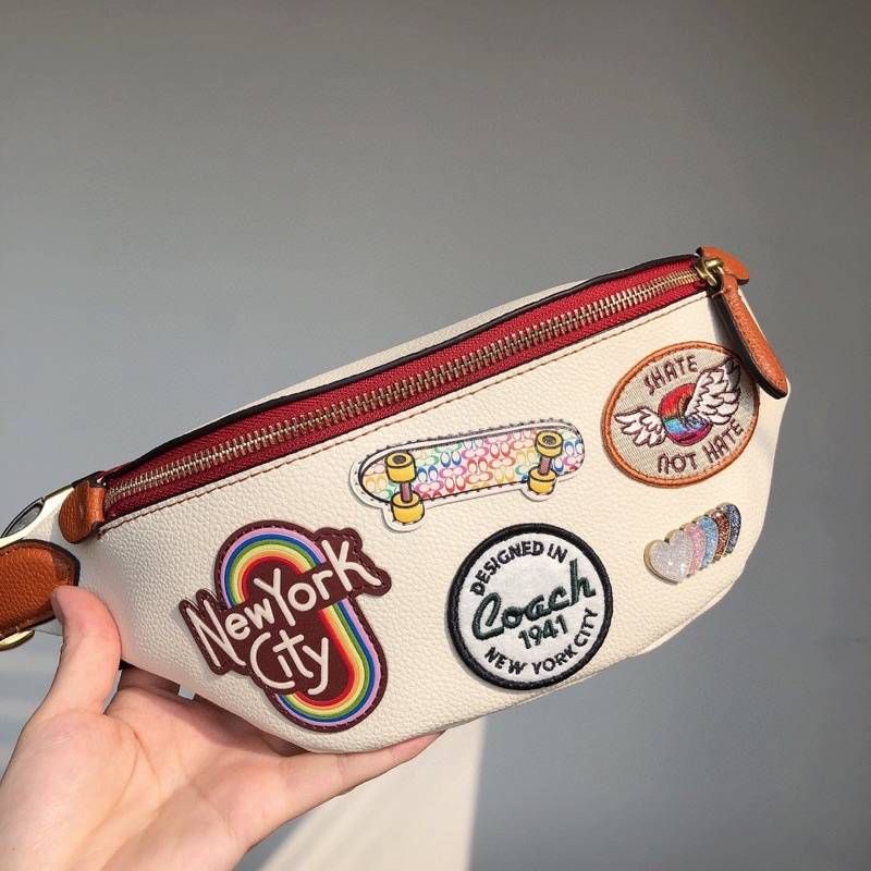 Túi bao tử Coa**ch da thật xịn xò