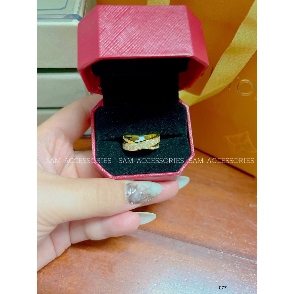 Nhẫn titan đá baguet chéo