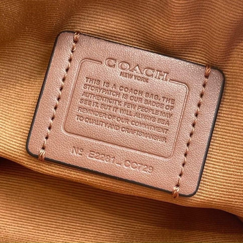 Túi đeo chéo Coach Top dáng tròn