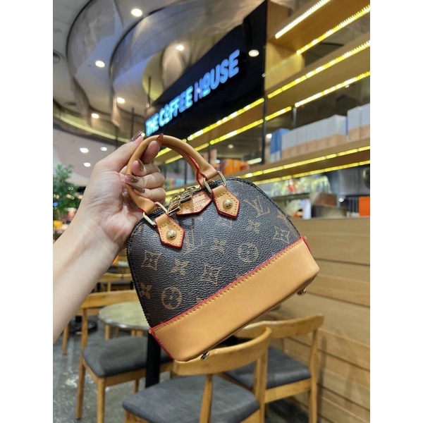 Túi xách nữ cầm tay dáng hến L v size 17cm