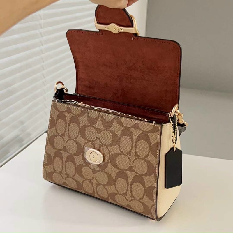 Túi đeo chéo Coach Morgan Top siêu trẻ trung