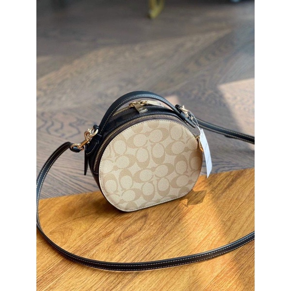 Túi đeo chéo Coach Top dáng tròn