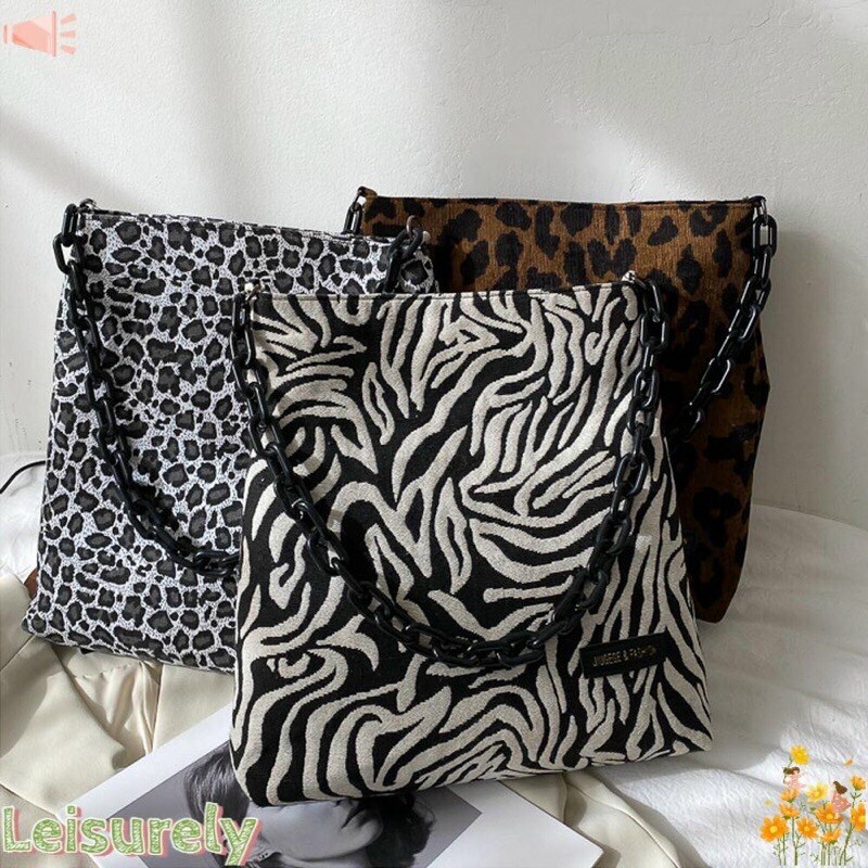 Túi đeo vai vải nhung họa tiết da báo cá tính cho nữ anhi