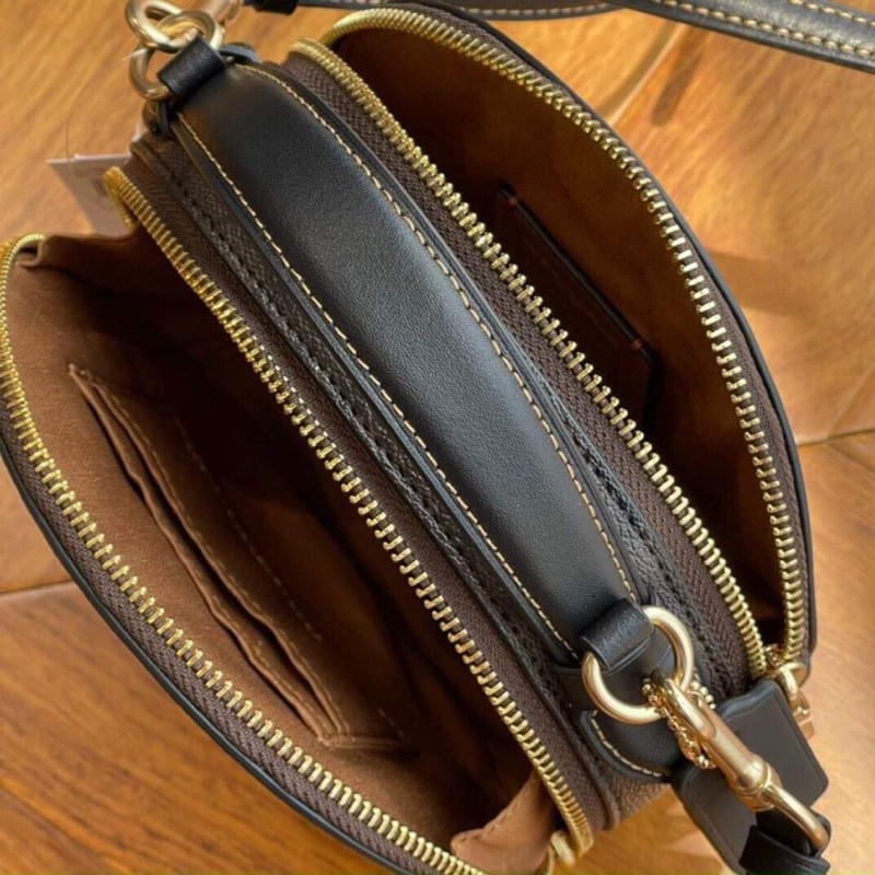 Túi đeo chéo Coach Top dáng tròn