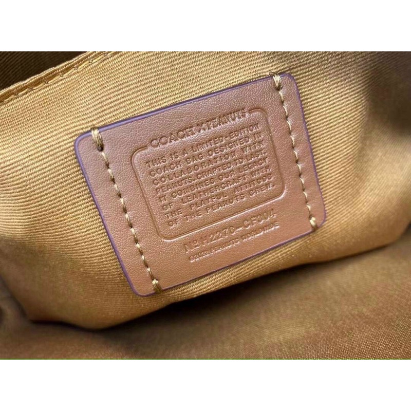 Túi đeo chéo unisex Coach X Peanuts