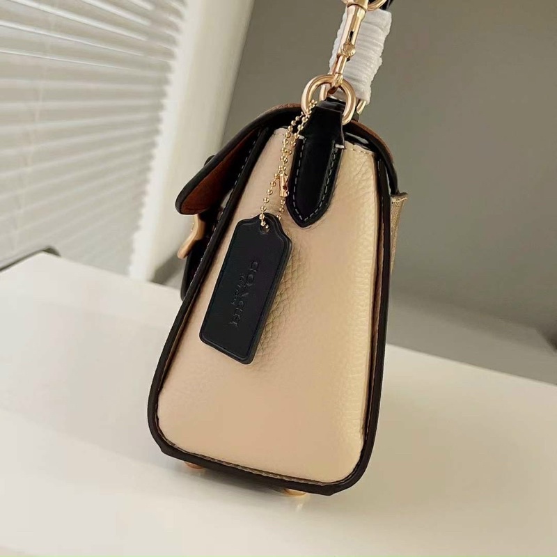 Túi đeo chéo Coach Morgan Top siêu trẻ trung