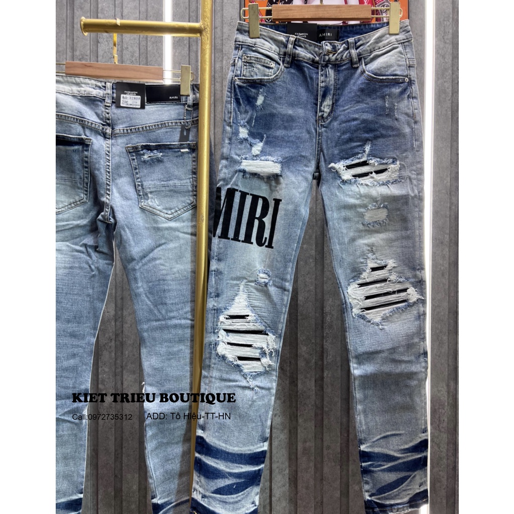 Quần Jeans Amiri vá đen chữ đùi màu xanh boy phố