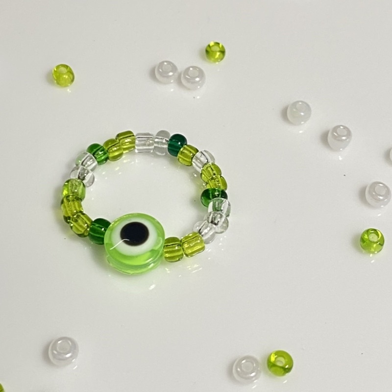 Nhẫn hạt cườm y2k mắt quỷ