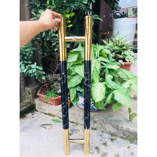 Tay nắm cửa kính, nhôm - Tay nắm thân đen giả đá đầu vàng.