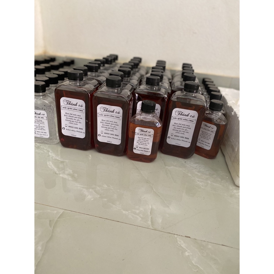 Dầu Quét Lồng Chim Thành cò chai 500ml